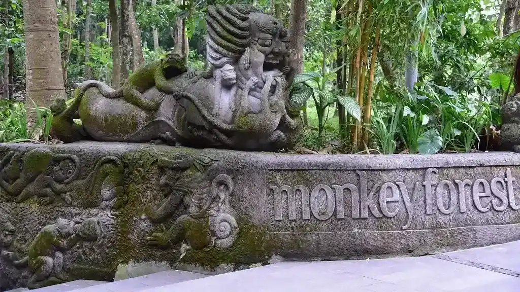 The carved stone entrance to the Sacred Monkey Forest Sanctuary in Ubud