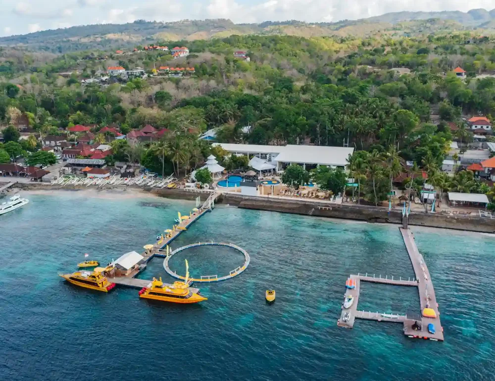 Boats and the passenger jetty at the harbour on Nusa Penida