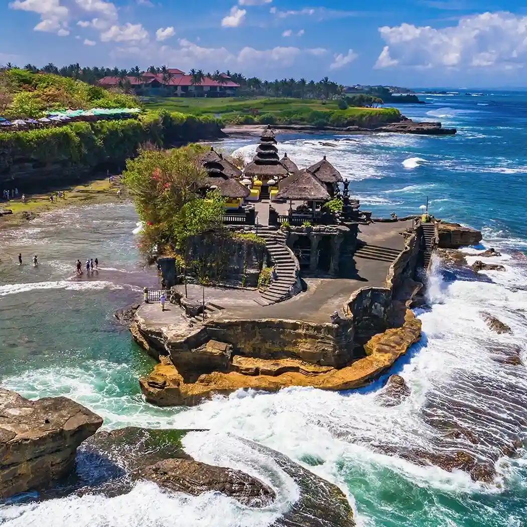 The sea temple of Tanah Lot on its rock, photographed from a helicopter
